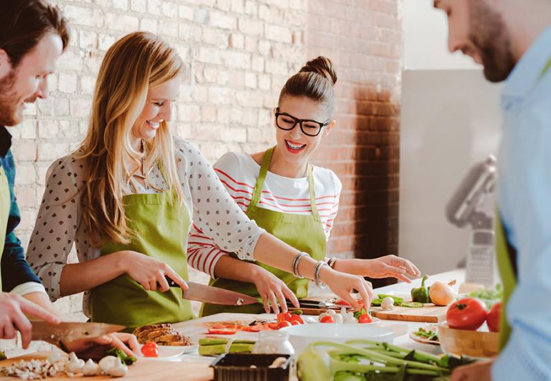 People in a cooking class which can can be an great networking opportunity