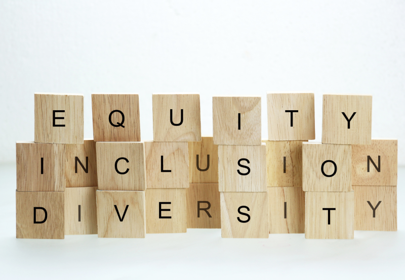 Blocks spelling out 'Equity, Inclusion, Diversity'.