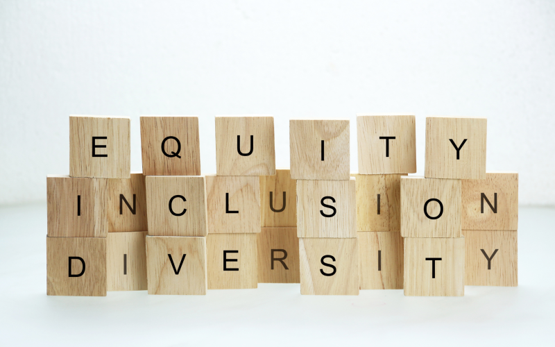 Blocks spelling out 'Equity, Inclusion, Diversity'.