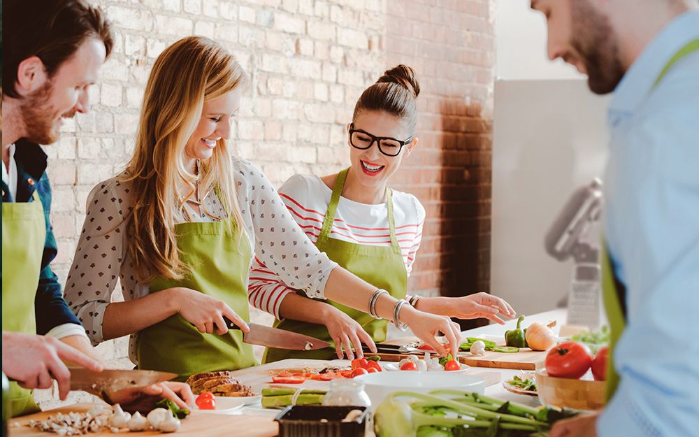 People in a cooking class which can can be an great networking opportunity