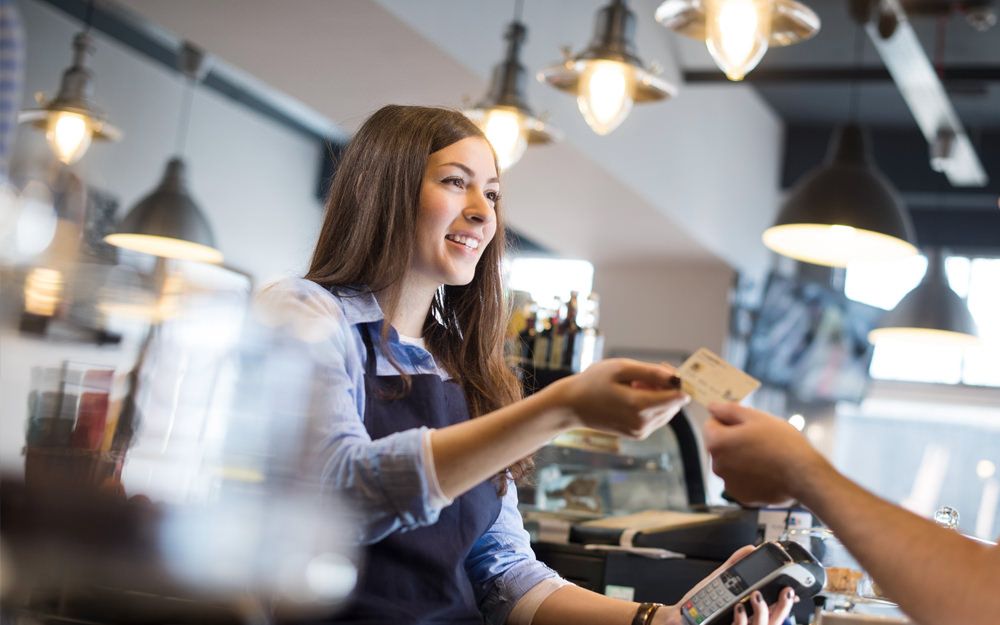 A Customer Service Agent working with a client using the excellent communication skills our recruitment agency identified during his interview. 